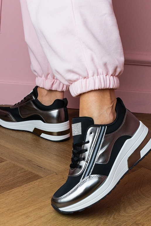 Zwarte dames sportschoenen met... Zwarte dames sportschoenen met...