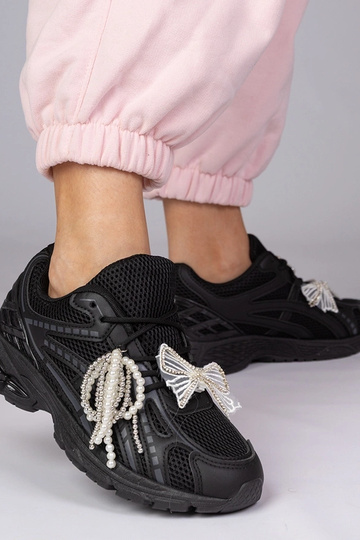 Schwarze Sportschuhe mit... 2