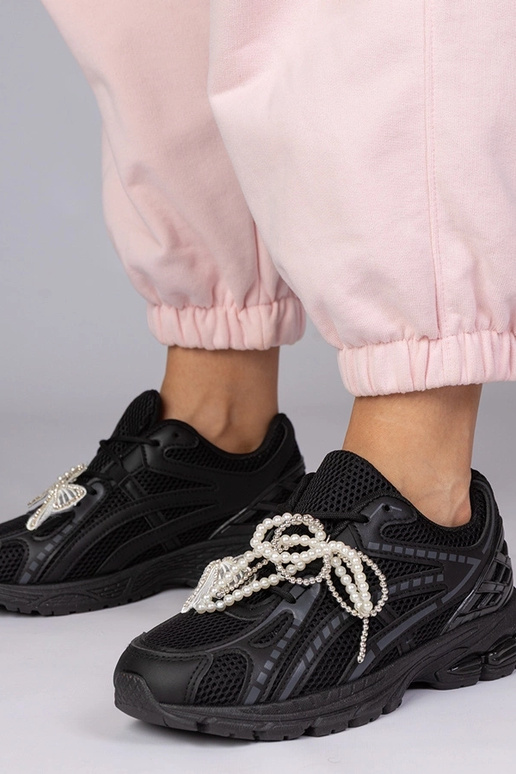 Schwarze Sportschuhe mit abnehmbaren...