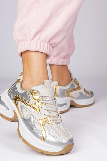 Gouden sportschoenen op... 2