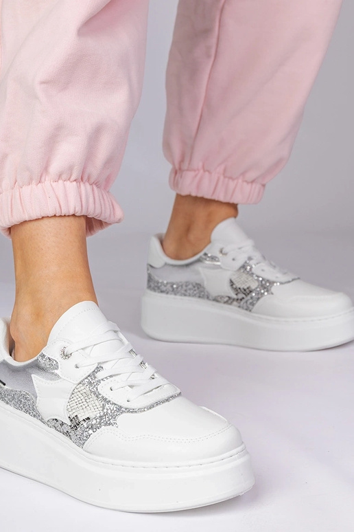 Witte sportschoenen met glitter en...