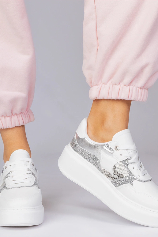 Witte sportschoenen met glitter en...