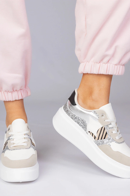 Zandkleurige sneakers met glitters en...