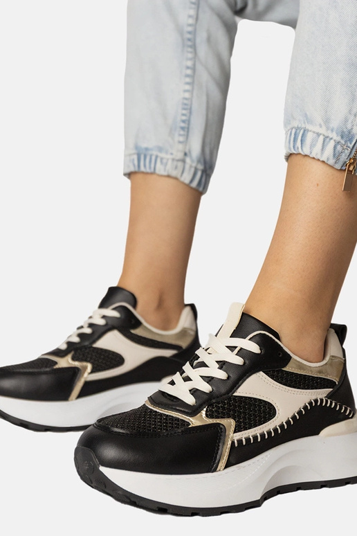 Zwarte sportschoenen met gevlochten...