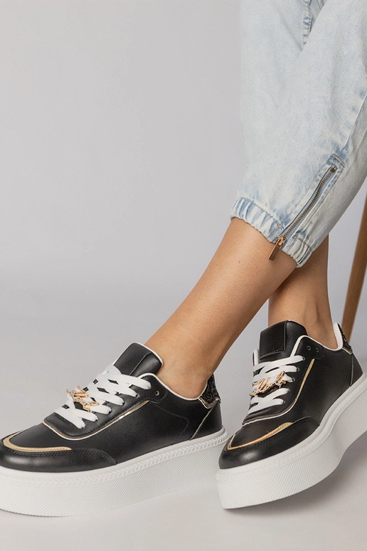 Baskets de sport noires avec...