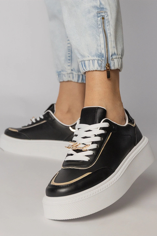 Baskets de sport noires avec...