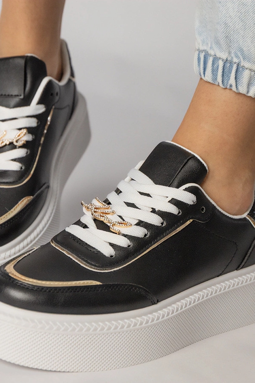 Baskets de sport noires avec...