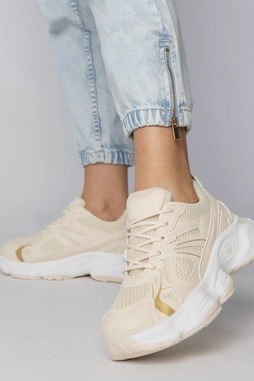 Sandfarbene Sportschuhe mit...