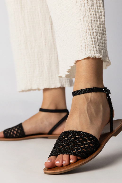 Schwarze geflochtene Sandalen mit...
