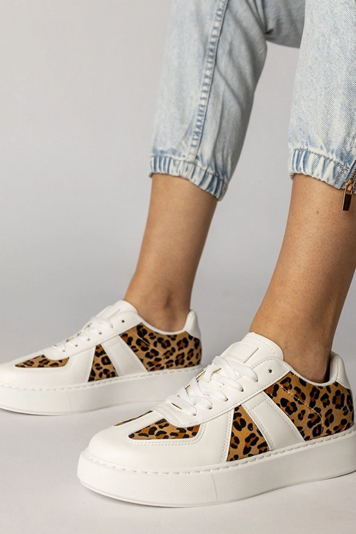 Witte dames sportschoenen met...