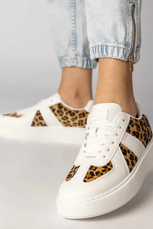 Witte dames sportschoenen met...