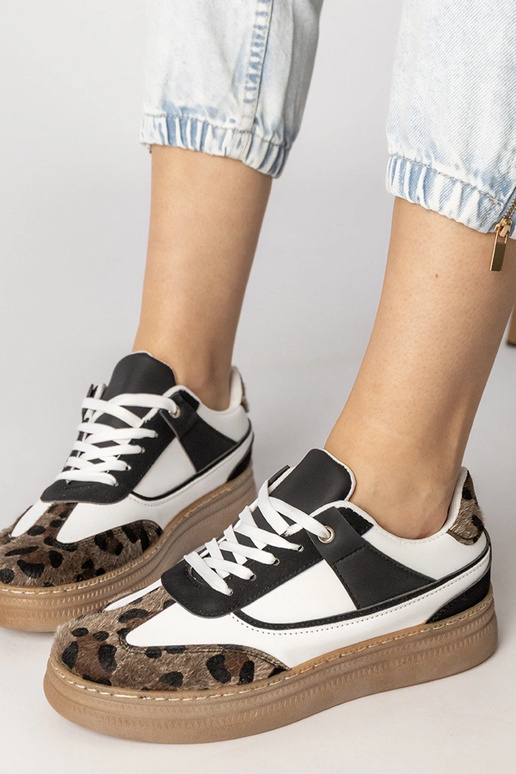 Schwarz-weiße Sneakers mit...