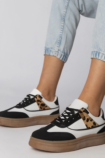 Wit-zwart sportschoenen met panterinzet, „Meril"