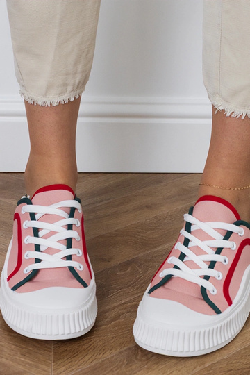 Roze dames schoenen op een...