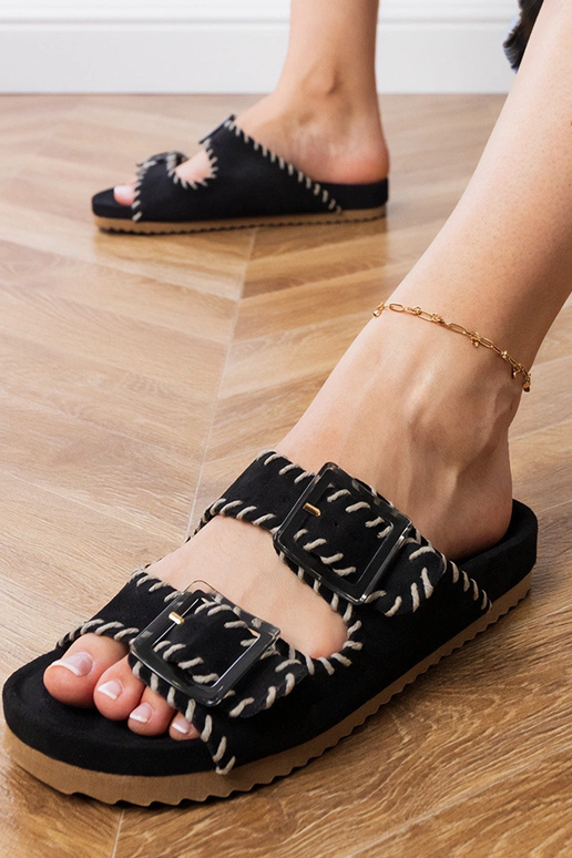 Schwarze Slipper mit Schnallen und...