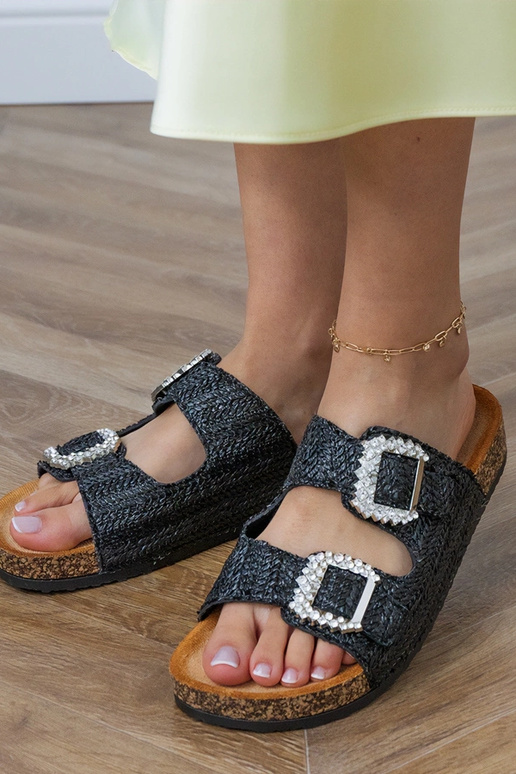 Pantoufles noires sur semelle en... Pantoufles noires sur semelle en...