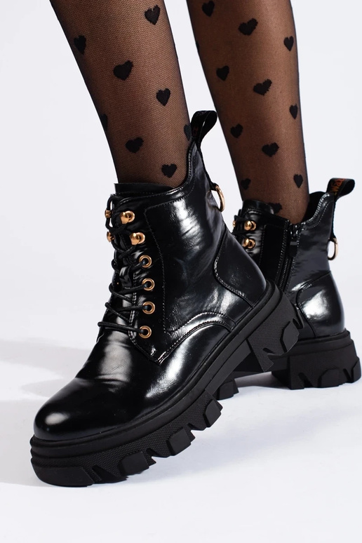 Damenstiefel mit Lackeffekt auf...