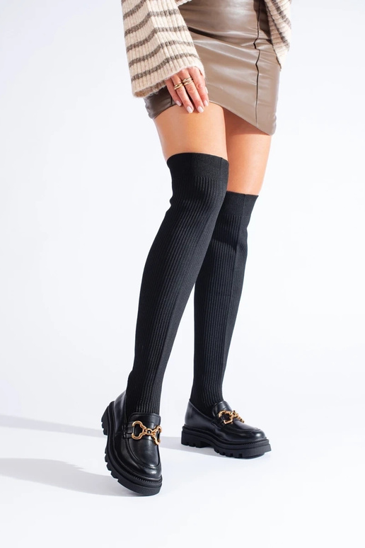 Schwarze Stiefeletten mit flexiblem... Schwarze Stiefeletten mit flexiblem...