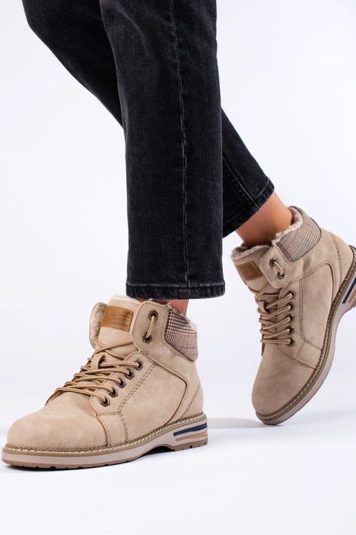 Beige geïsoleerde dameslaarzen Beige geïsoleerde dameslaarzen