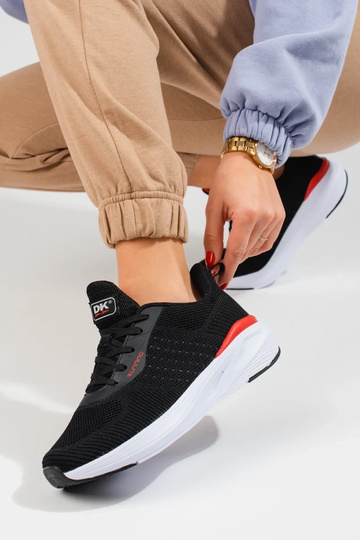 chaussures de sport noires... 2