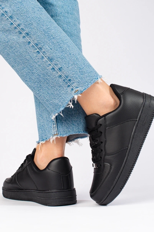 Chaussures de sport noires modèle... Chaussures de sport noires modèle...