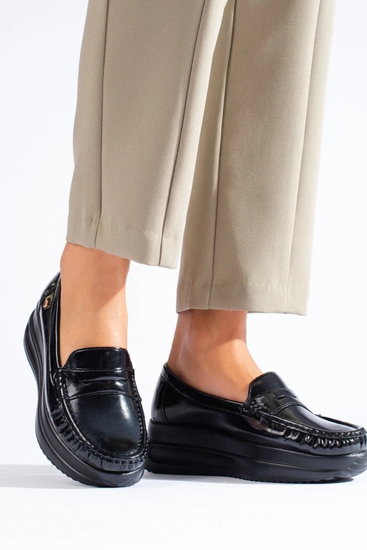 Zwarte mocassins met patenteffect en... Zwarte mocassins met patenteffect en...