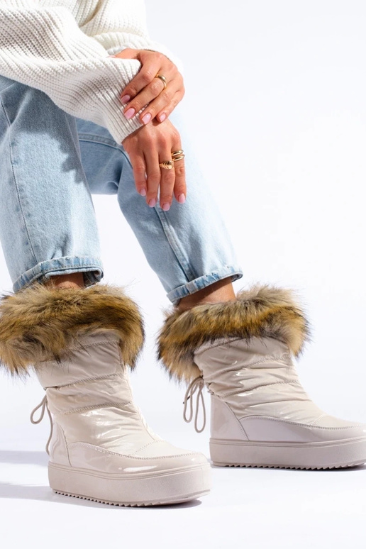 Cremefarbene Damen-Schneestiefel mit... Cremefarbene Damen-Schneestiefel mit...