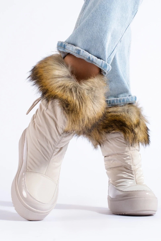 Bottines de neige femme crème avec...