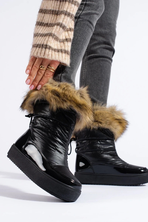 Boots de neige femme noires avec... Boots de neige femme noires avec...