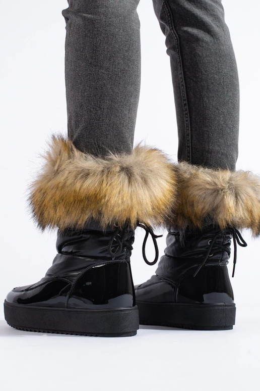 Boots de neige femme noires avec... Boots de neige femme noires avec...