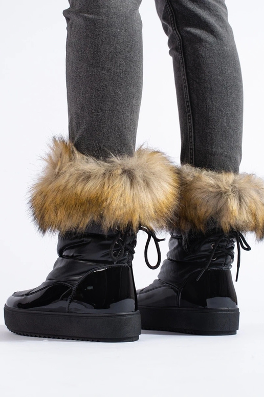 Boots de neige femme noires avec... Boots de neige femme noires avec...