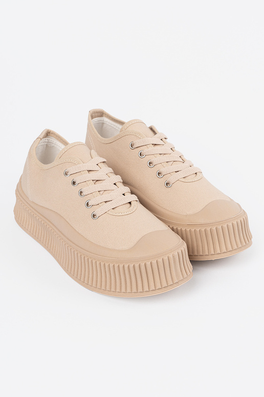 Chaussures beige pour femmes avec... Chaussures beige pour femmes avec...