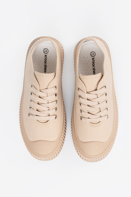 Chaussures beige pour femmes avec... Chaussures beige pour femmes avec...