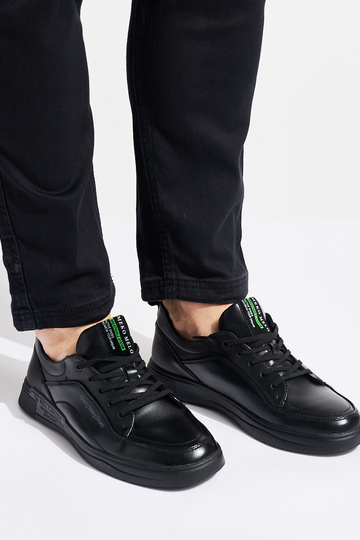 schwarze Sportschuhe für... 2