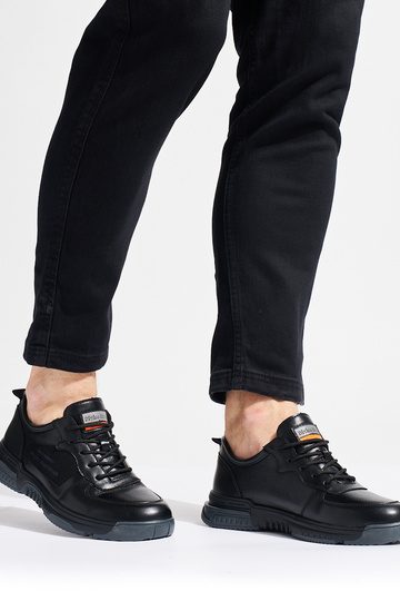 schwarze Sportschuhe für... 2