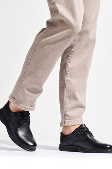 Schwarze Herrenstiefeletten... 2