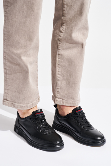 schwarze Sportschuhe für... 2