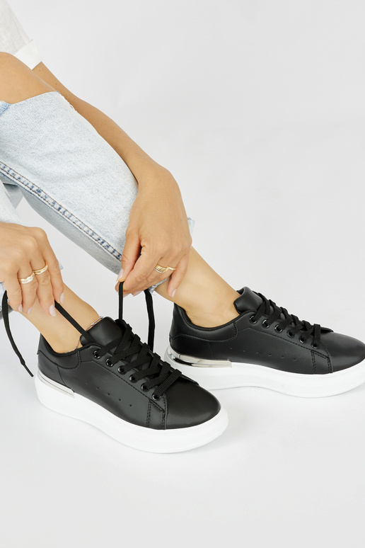 Schwarze klassische Damen-Sneakers...