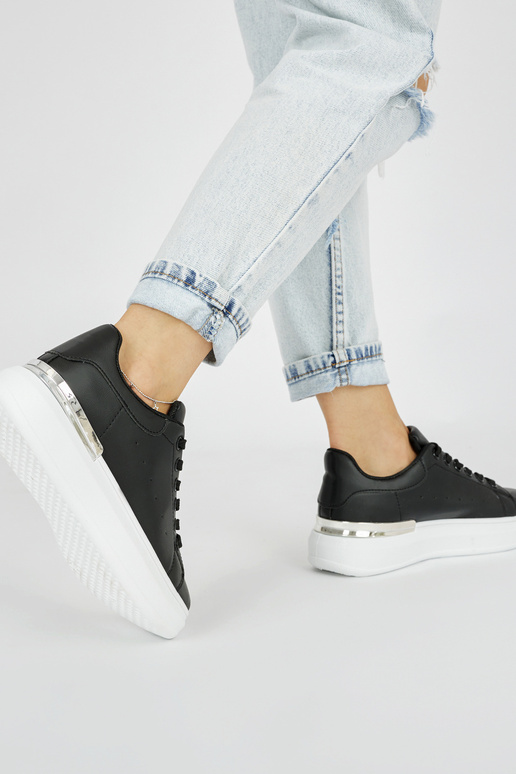 Schwarze klassische Damen-Sneakers...