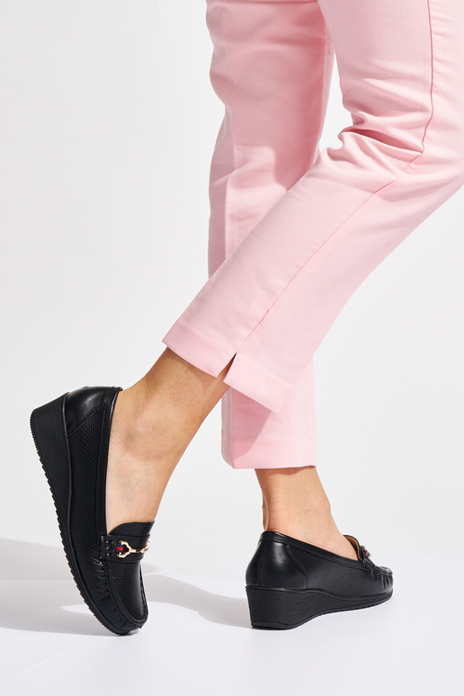 couleur noire mocassins sur un coin couleur noire mocassins sur un coin