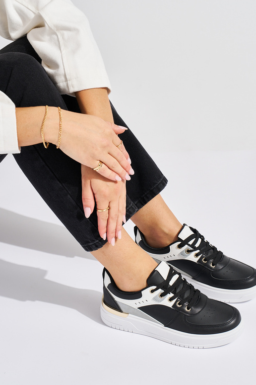 chaussures de sport noires avec...