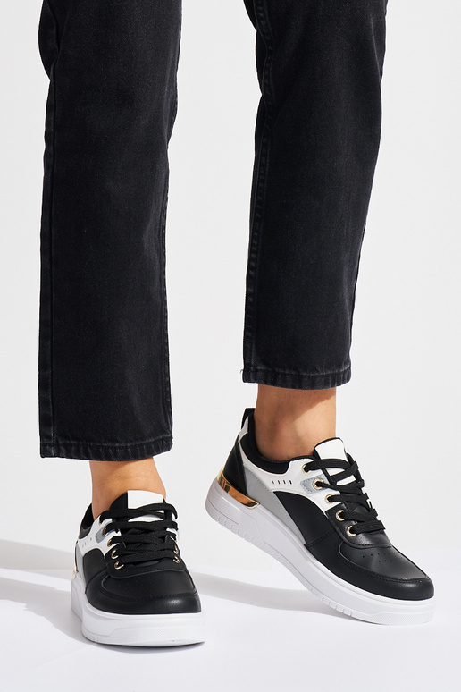 chaussures de sport noires avec...