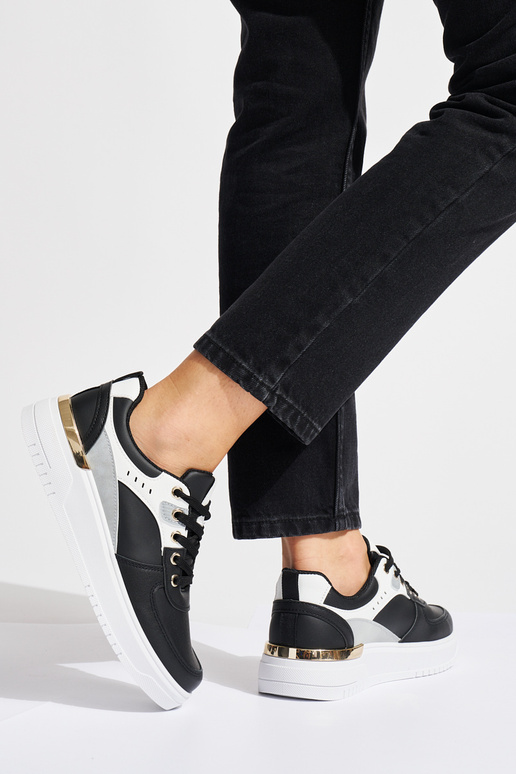 chaussures de sport noires avec...