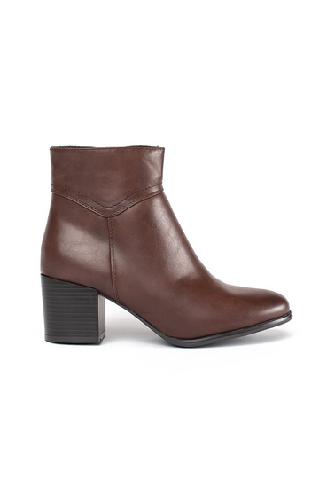 bottes marron par Sergio Leone