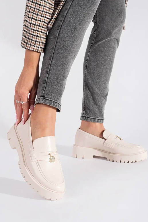 Beige Mokassins für Damen mit einer... Beige Mokassins für Damen mit einer...