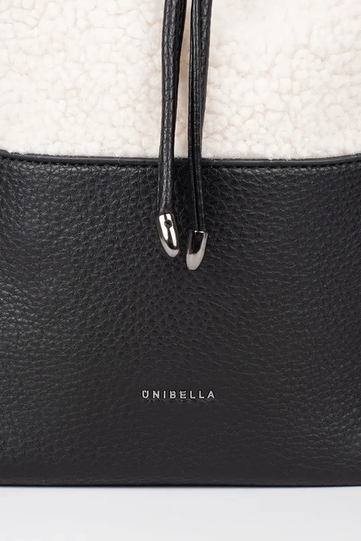 Schwarze elegante Handtasche mit Fell