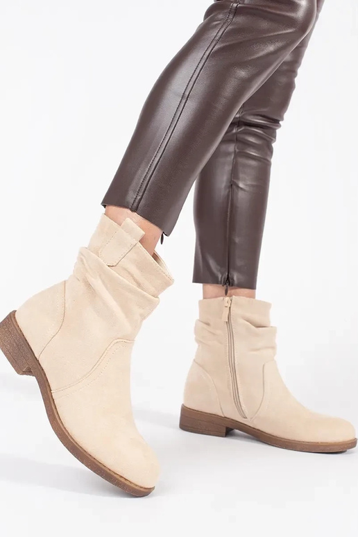 Bottes de cow-boy beige Bottes de cow-boy beige