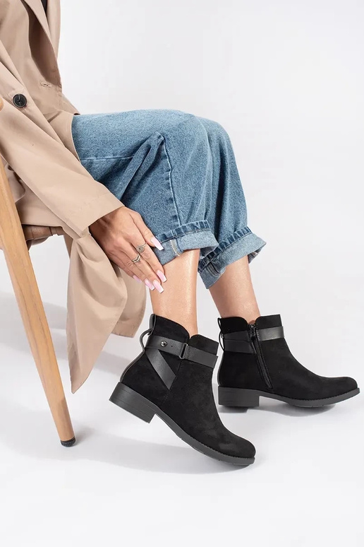 Zwart suède dameslaarzen met... Zwart suède dameslaarzen met...