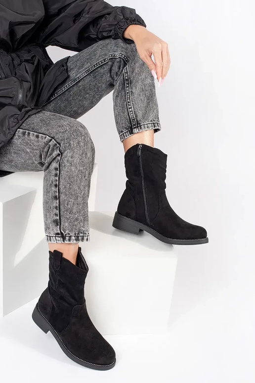 Bottes de cow-boy en daim noir pour... Bottes de cow-boy en daim noir pour...