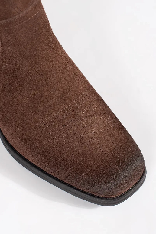 Bottes de cow-boy en cuir marron... Bottes de cow-boy en cuir marron...